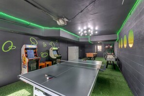 The house is designed for large families with plenty of space for kids to play while adults relax. The massive and fun-filled game room is sure to be a hit!