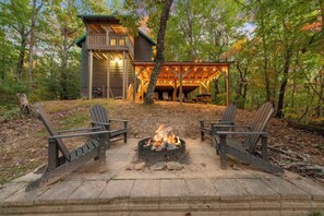 A beautiful view of the cabin from the firepit.