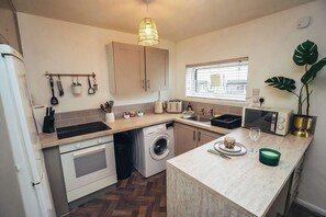 A classic design with all the modern essentials, ready for your culinary creations.