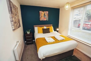 Relax and recharge in this stylishly designed bedroom