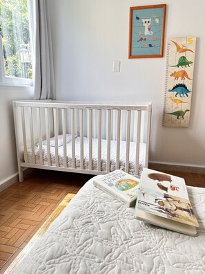 BR1: crib, children's books, and outlet covers available