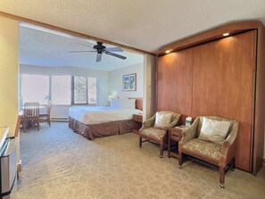 Sitting  Area and the murphy bed | Listed with @BookTraverse
