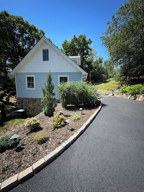 Paved driveway entrance to the house