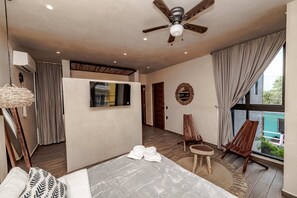 Kitchen with sink and refrigerator in Tulum apartment