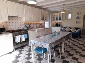 The superbly equipped kitchen is complete with two family sized dishwashers.