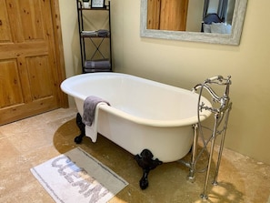 Take a soak in the clawfoot tub