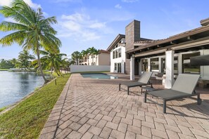 Basking in Luxury: An Amazing Poolfront Oasis with Breathtaking Lake Views 