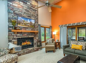 Warm and inviting living room with a gas fireplace and plenty of space for all to gather