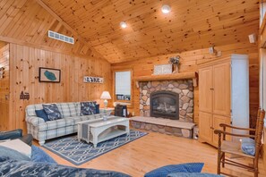 Living room with a gas fireplace for you to enjoy!