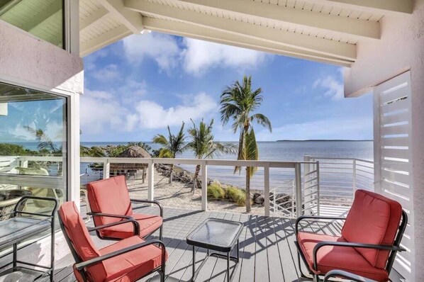 spacious outdoor seating area with ocean view