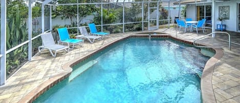 Relax in the Sun in the Screened-In Patio Oasis