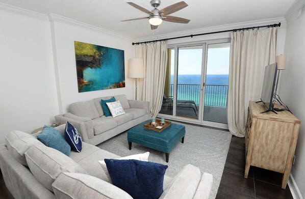 Living room 
Queen sleeper Sofa
Loveseat
TV
Balcony with View