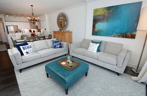 Living room 
Queen Sleeper Sofa
Loveseat
Bar seating and Kitchen
