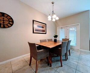 Designed with both style and function in mind, the dining area is the perfect spot for morning coffee, evening dinners, or game nights with friends and family