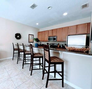 Bright and spacious kitchen, complete with all the essentials for home-cooked meals