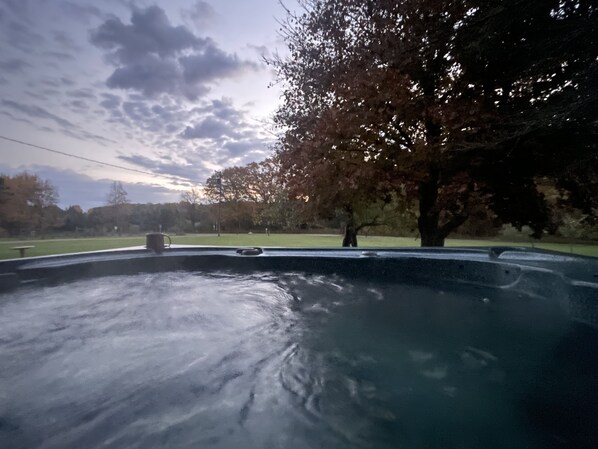 Sunrise from our hot tub located on our covered front porch.