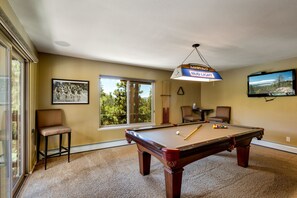 Challenge your friends to a game of pool in the stylish game room