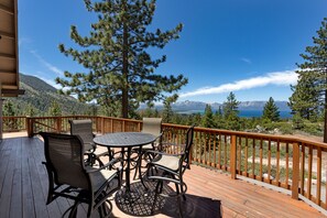 Dine outdoors with panoramic views of the mountains and towering pines