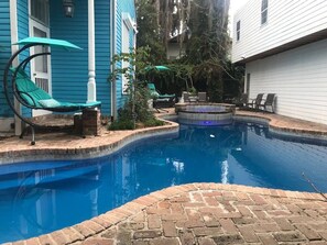 Heated lagoon-style pool and jacuzzi