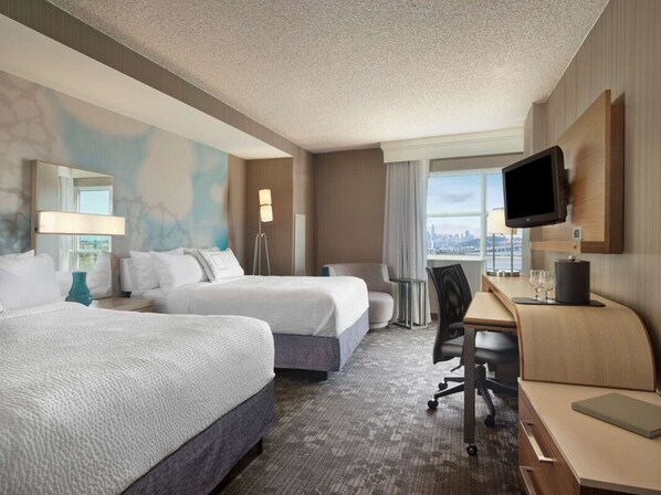 Unit with 2 Queen beds. Exact unit will be assigned upon arrival. Views, colors, and decor may vary.