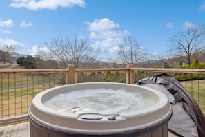 Bañera de hidromasaje al aire libre