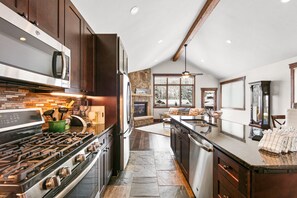 Beautiful kitchen with granite countertops and stainless steel appliances.