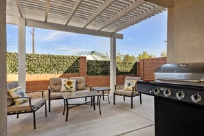 Pergola, patio seating, Grill, private backyard