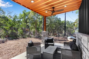 Outdoor couch set under the covered patio