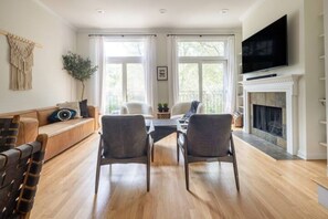 Living Room  w cozy fireplace and plenty of seating.