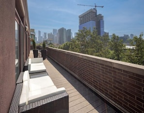 Enjoy the city views from the 4th floor balcony adjacent to family room.