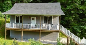 Lower porch patio with lake view has been added since this photo was taken.