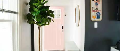 Welcome to the Pink Door Place. Feel at home in this cozy, chill spot!
