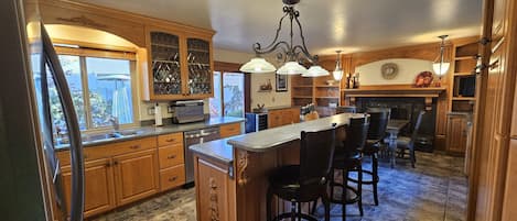 Expansive Kitchen and Dining Area. Enjoy the Wine Chiller too!