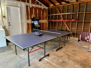 Regular size ping poing table, arcades and large connect 4 game