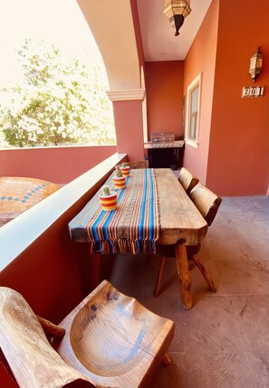 Patio with dining table and private BBQ 