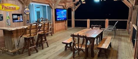 Huge Amish handcrafted deck with bar, fire pit, 75" TV and 7 person hot tub