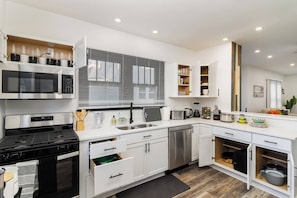 Fully loaded Kitchen with |Outdoor Dinning Set||kids dinnerware||Mixing Bowls||Sharp knife set||24 different spices||Blender||Kettle||Toaster||Paper Towl||Copping Boards||Water Filter||Cooking Spoons||Air Fryer||Plates||Cups||Dishes|