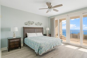 Primary Bedroom with Ocean Views, King Size Bed, Flat Screen TV, Ensuite Bathroom and Private Balcony Access