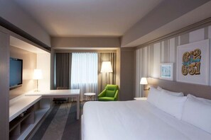 Unit with King bed. Exact unit will be assigned upon arrival. Views, colors, and decor may vary.