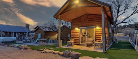 Well Lit Patio and Green Scaped Yard