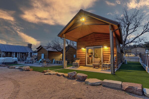 Well Lit Patio and Green Scaped Yard