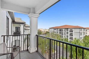 Aerial Retreat private balcony of the condo in Orlando Florida - Panoramic stunning view visible from the balcony - Relaxing seating on the balcony, providing  comfortable spaces to unwind