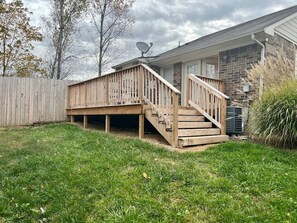 Back yard with spacious deck.