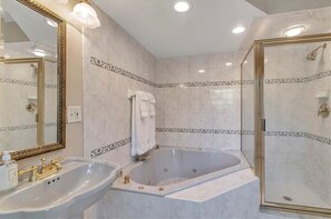 Expansive Bathroom Featuring a Seperate Tub and Shower