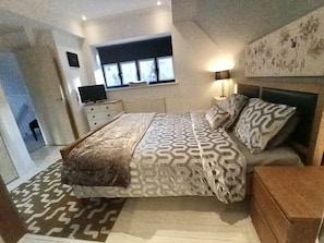 Bedroom with newly refurbished ensuite bathroom.