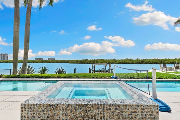 Swim, soak, or sip with stunning bay views