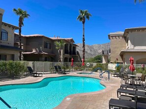 The shared pool and hot tub with incredible views of the mountains