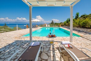 Relax by Eleni%27s poolside with a view