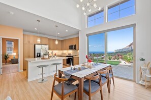 Dining area and kitchen also provide mountain and ocean views.