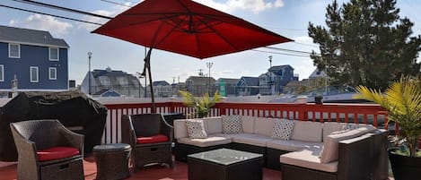 Take some sun in on the large front deck with BBQ grill.